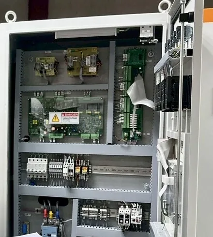 Inside the ESP T/R controller cabinet: control boards, miniature circuit breakers and terminal rails