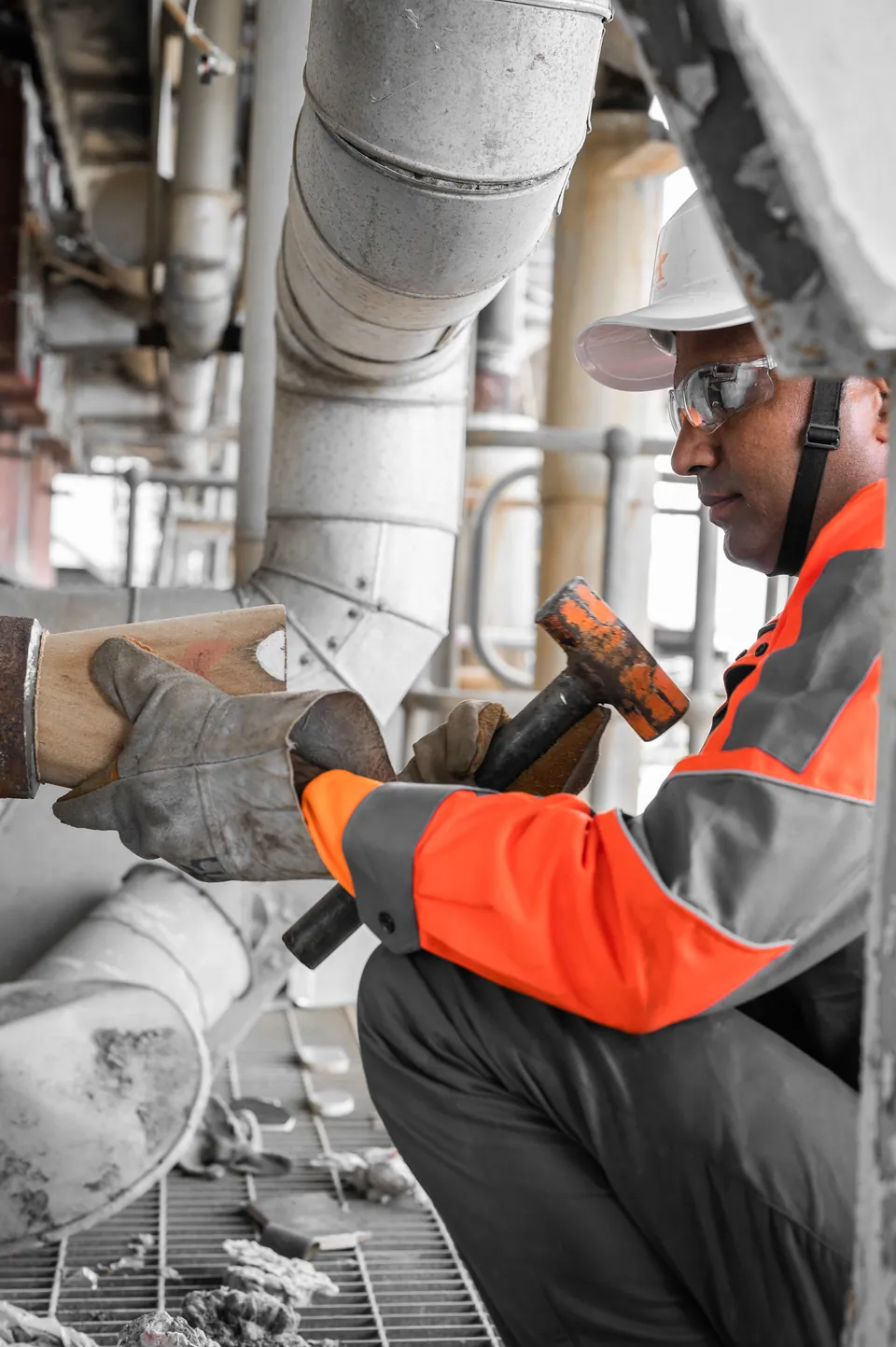 Arrow Energy technician working on ducting during a boiler outage